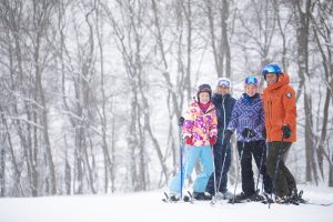 Family of 4 Skiing